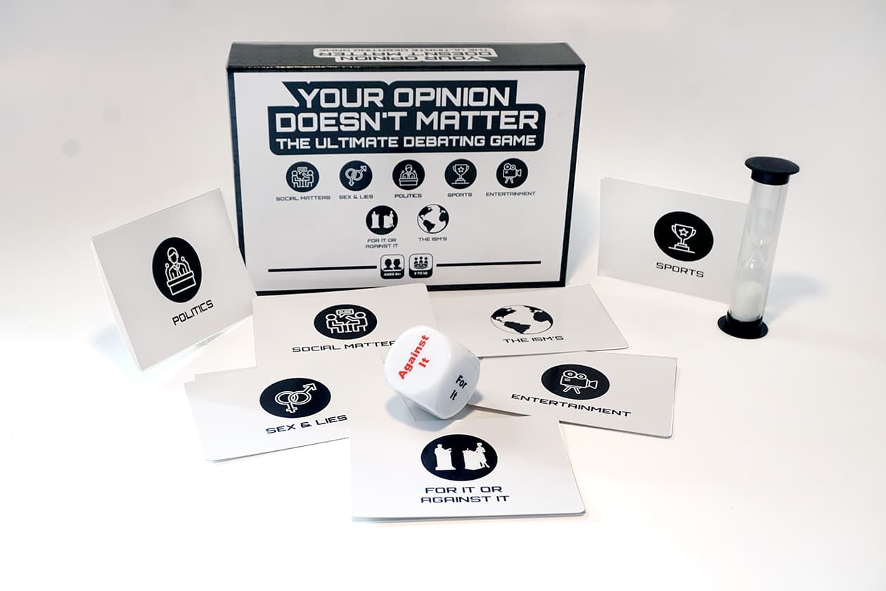 The finished YODM game — box, cards, timer, and die